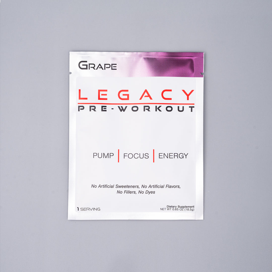 Packets of Legacy Pre-Workout Grape. The packets are designed for single-serve use and are laid out on a neutral background.
