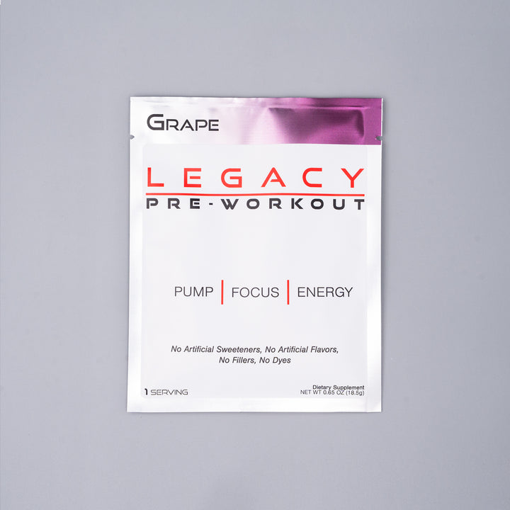 Packets of Legacy Pre-Workout Grape. The packets are designed for single-serve use and are laid out on a neutral background.